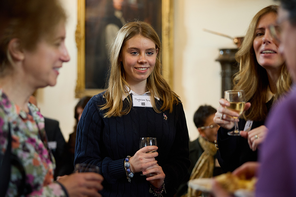 People talking at the Tower Poetry prizegiving event.