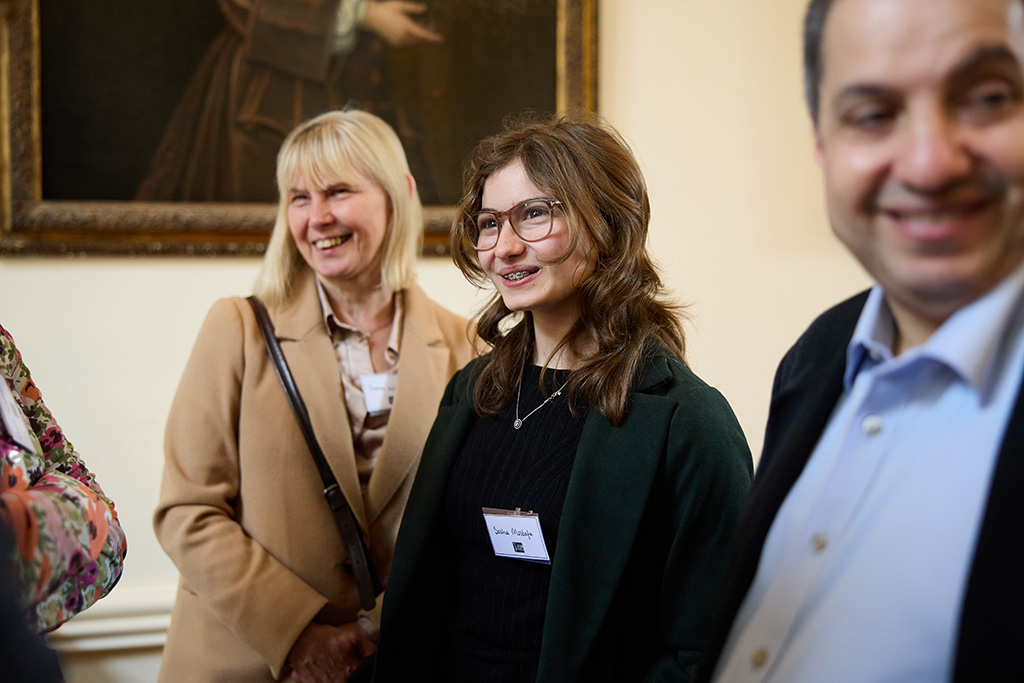 People talking at the Tower Poetry prizegiving event