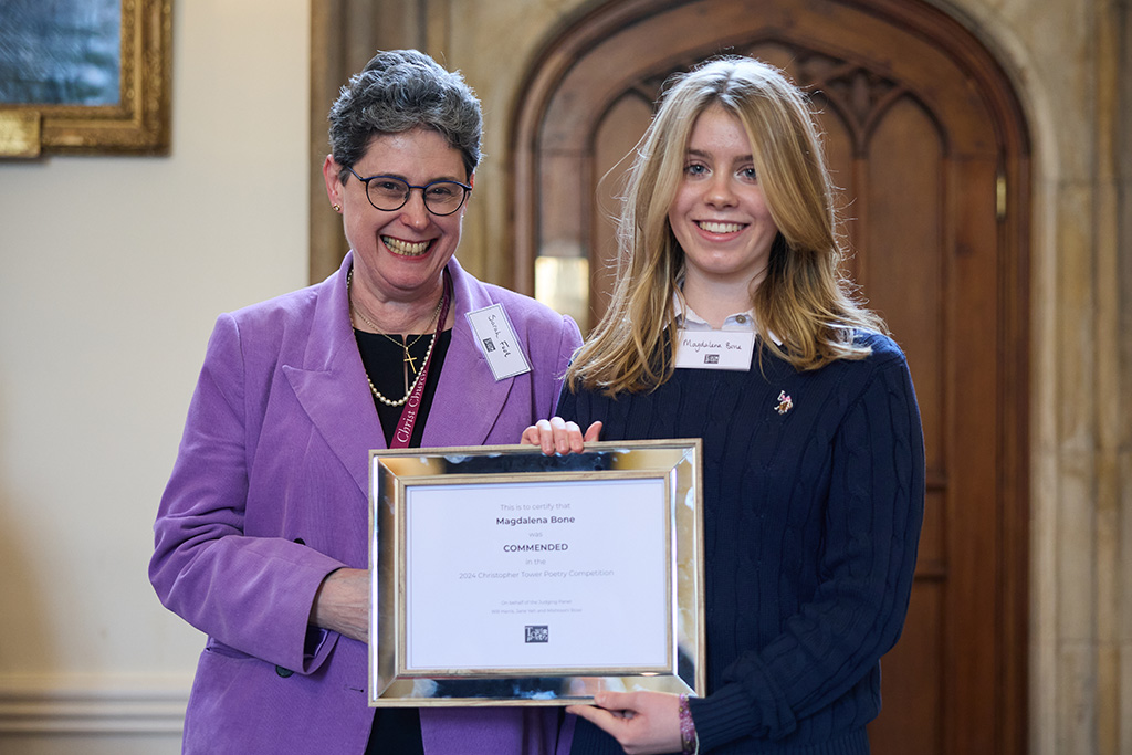 The Dean presenting certificates to the winners