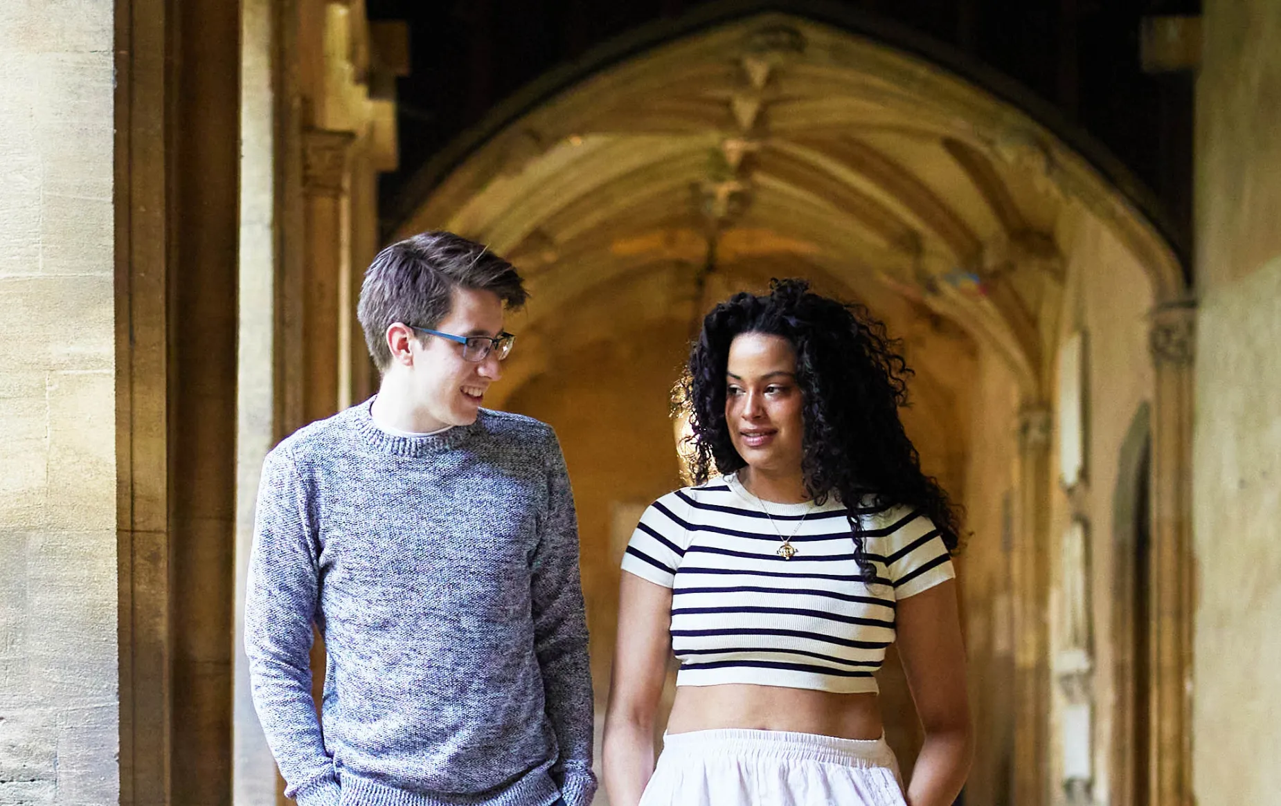 Students walking in the cloister