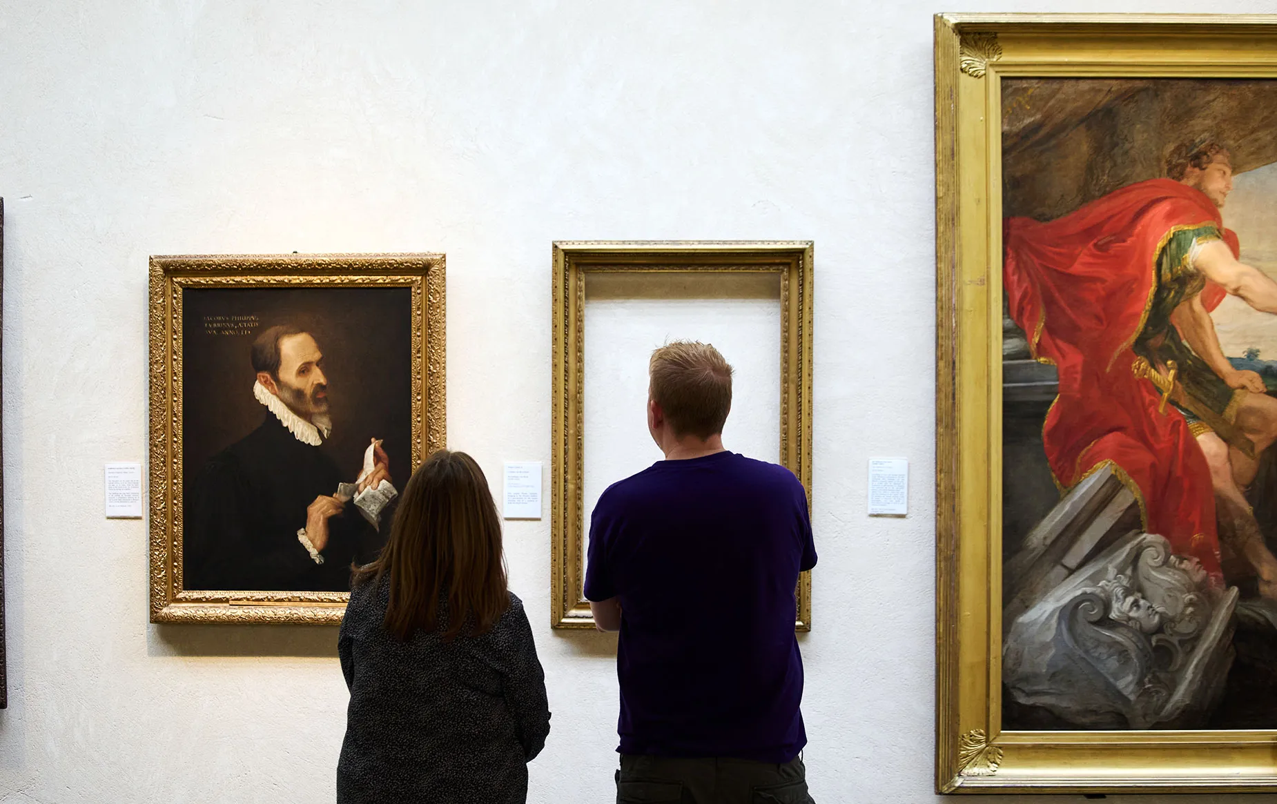 An empty frame hanging in the Picture Gallery as a reminder of the missing paintings