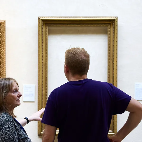 An empty frame hanging in the Picture Gallery as a reminder of the missing paintings